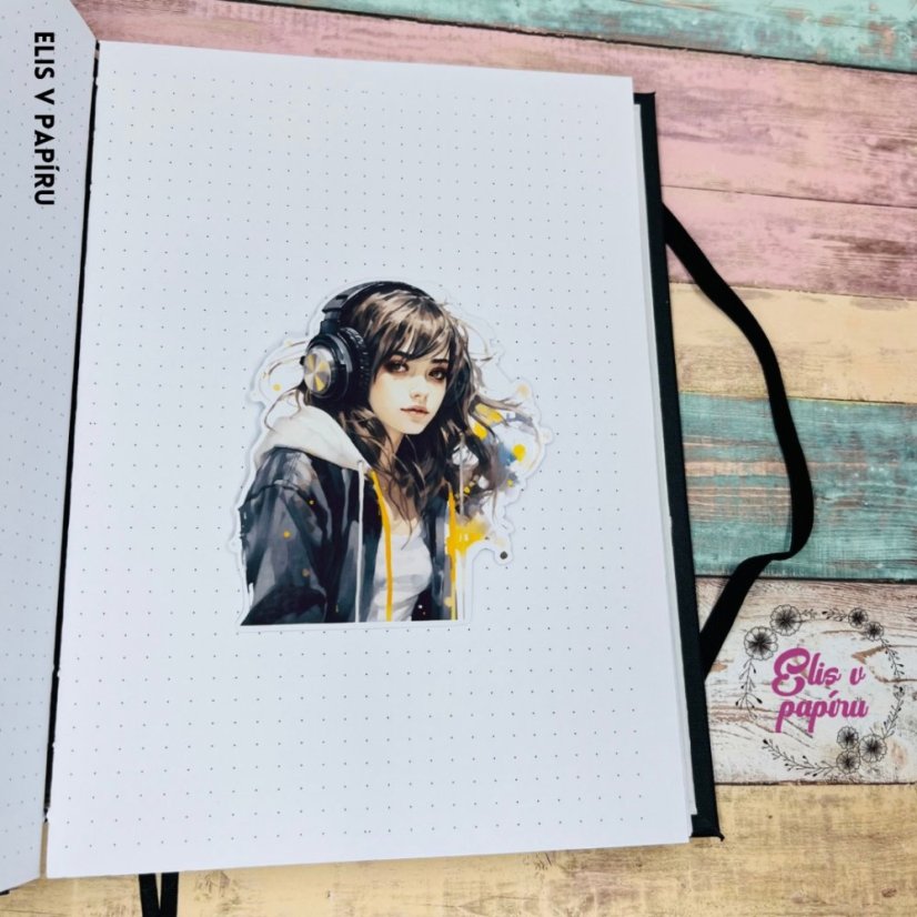 Velká kusová samolepky a motivem dívky v černé, která poslouchá muziku.