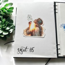 Dívka, co foukala světlo | Samolepky do diáře
